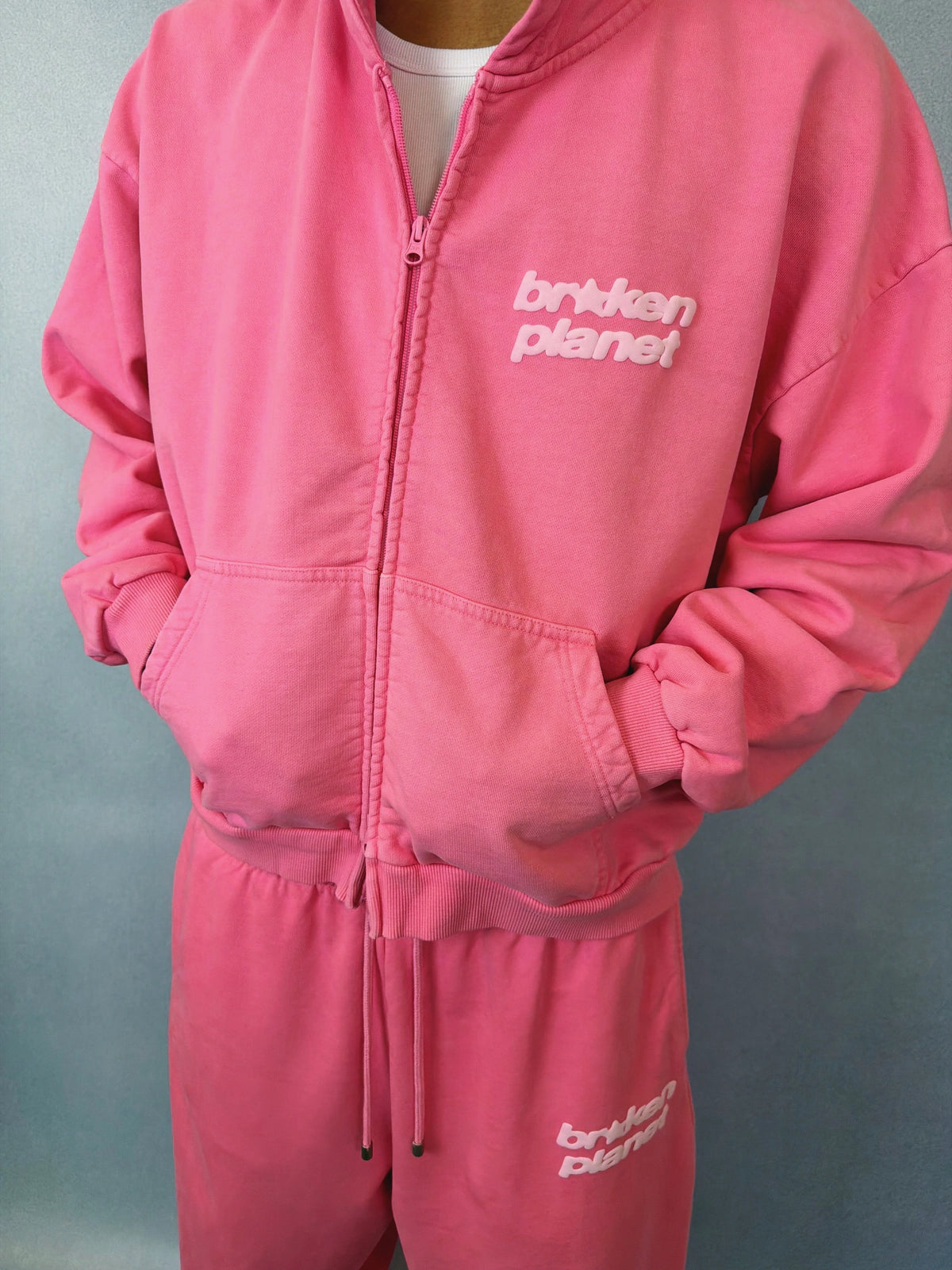 BROKEN PLANET STAR ZIP UP HOODIE PINK